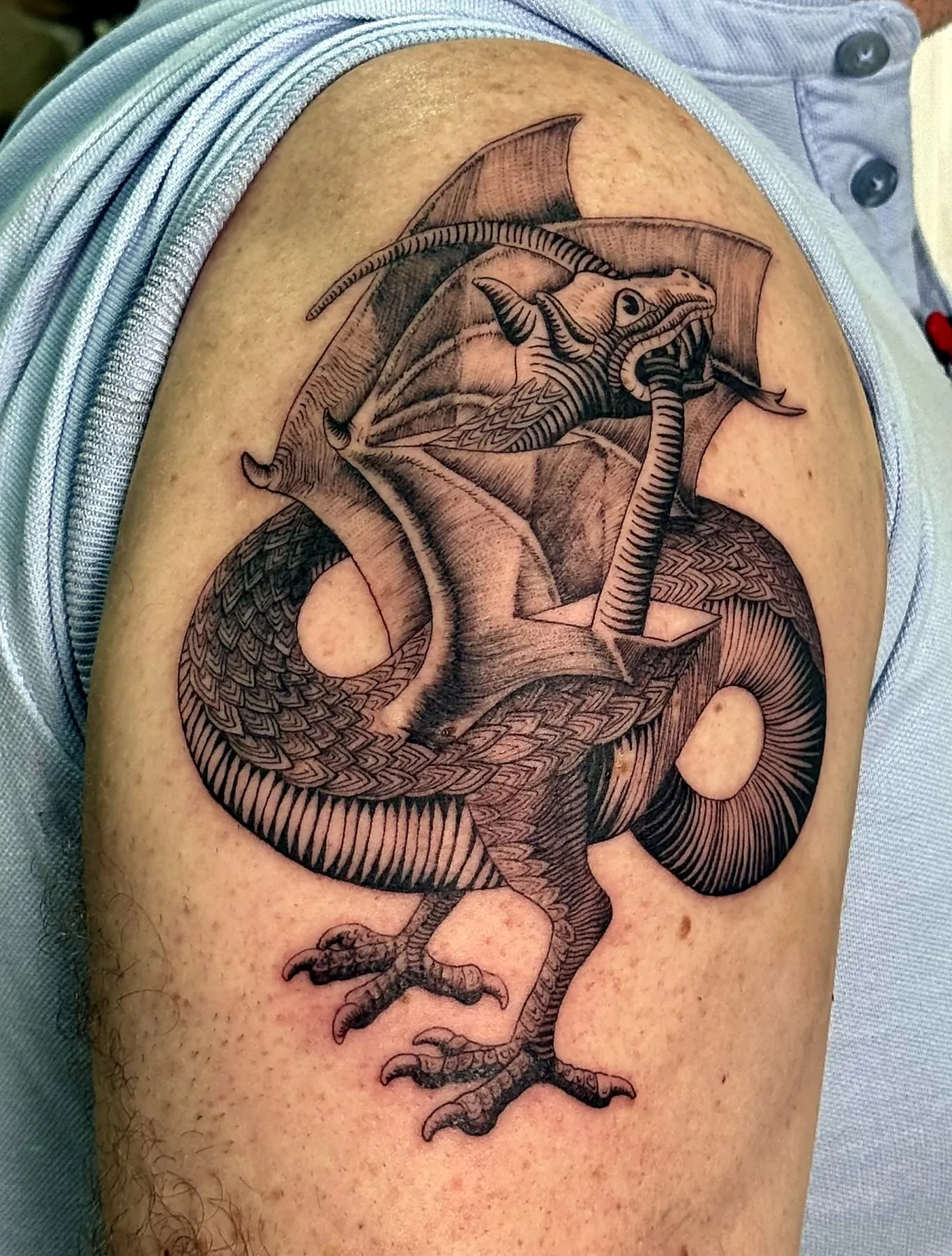 Japanese-style dragon, black and grey, upper arm